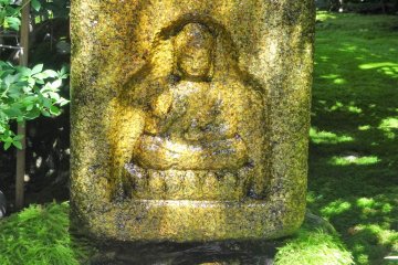 A stone carving in the garden of Myoryu-ji