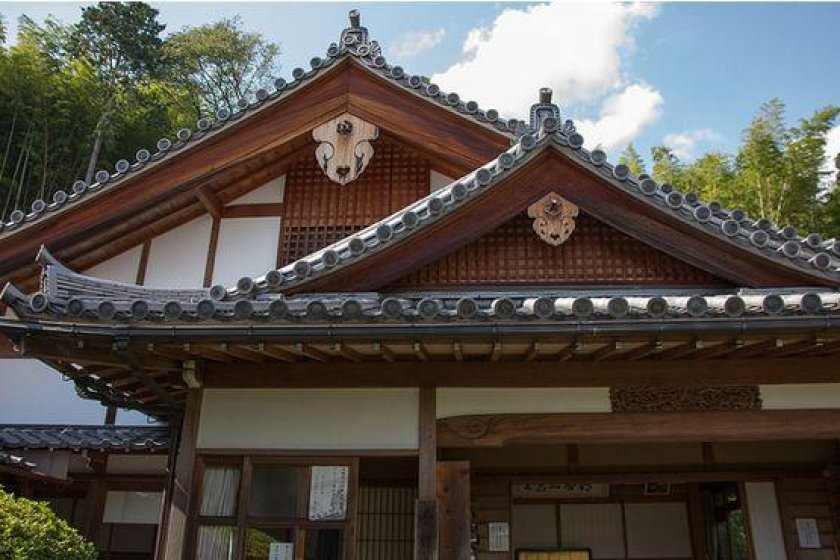 Suzumushi Temple\'s natural hues allow it to blend in easily with nature.