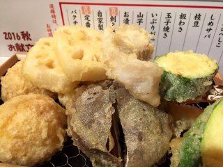 Our order - renkon, shiitake mushrooms, zukkini, egg, shrimp, and fish tempura