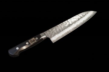 Damascus steel with dimpled blade