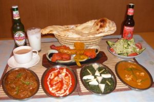 A banquet fit for a maharajah or sumo wrester with curries chicken and naan at Asian Sitaare in Kintetsu Fuse in Osaka
