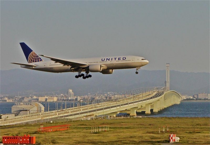 Plane gets in landing position at Kansai International Airport