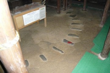 Stones in the floor to assist in turning the rotating stage above