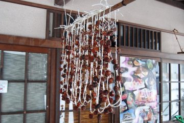 Persimmon hanging outside for drying at Orizuru restaurant