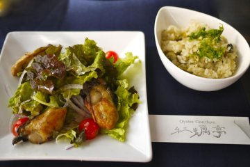 Oyster sauteed with salad and oyster rice