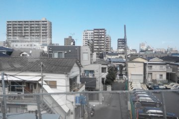 Japanse-style houses seen from the window of the train going to Akihabara.