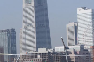 Worker with Landmark Tower in background