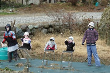 Scarecrow family near Lake Saiko