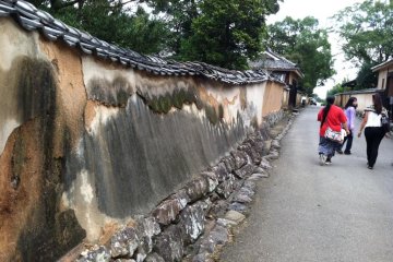 The warped walls lining the streets in Kitsuki