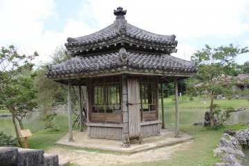 <p>The Rokkakudo is a small black tile roofed hexagon shaped resting area built on a small island in the pond at Shikinaen Royal Garden</p>