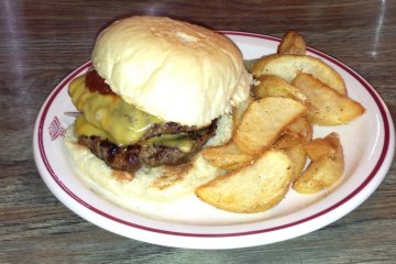 <p>The double cheeseburger looses the lettuce and tomato in favor of Gordie&#39;s own barbeque sauce and here is served on what appears to be a surplus plate from a local U.S. miitary hospital</p>