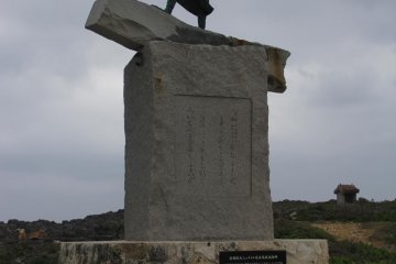 <p>This statue along the walking paths at Cape Zanpa points directly at the end of Cape Zanpa</p>