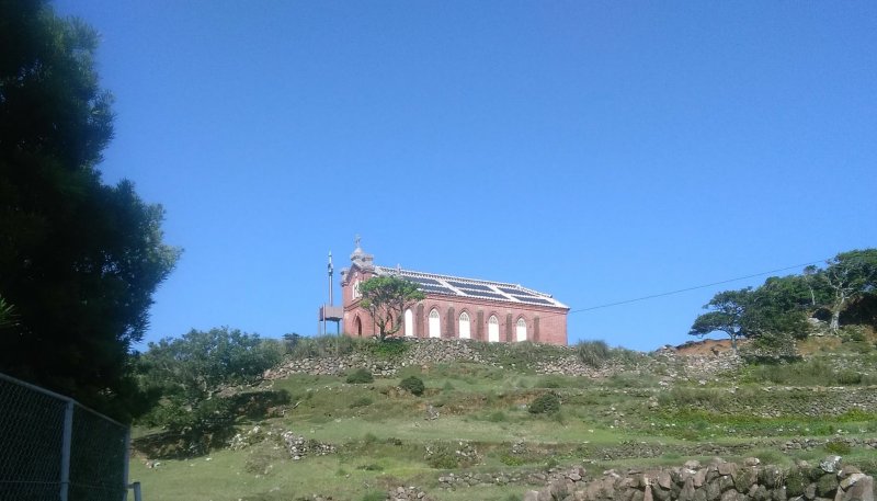 Nokubi, the former church from a distance. Notice the roof tile white lines