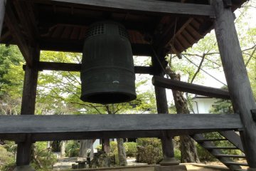 A very large bell at the top of the stairs. A sign says do not ring the bell. It is very tempting, being so large.