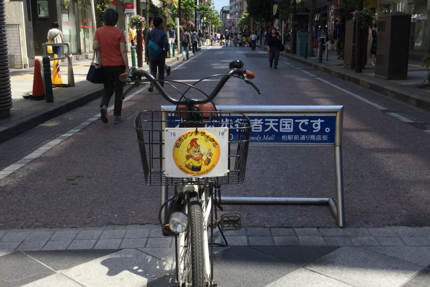 A Kashiwa City rental bike with the Reysol mascot on the basket