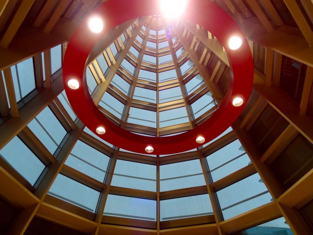 Entering the atrium, standing inside the inverted glass cone