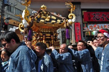 Residents carrying the mikoshi