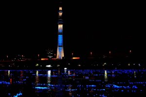 Tokyo Sky Tree and the Sumida River bathed in blue light