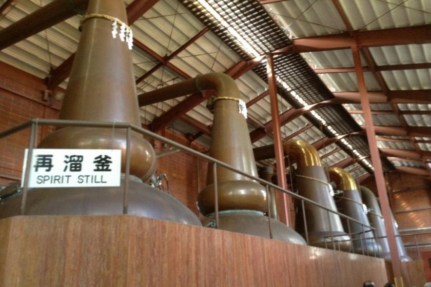 Take a whiff. Yes, the smell of whisky invades every corner of this massive distellery room.