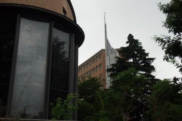 St. Ignatius Church is easily recognized by the tall silver tower with a cross on top.