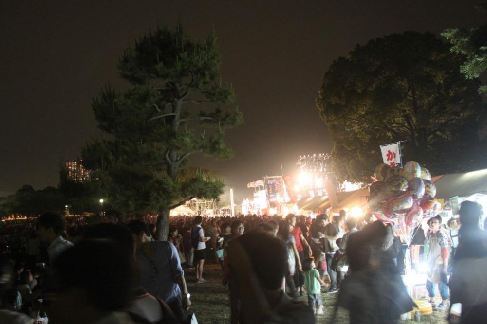 There is a paying-area and a non-paying area for the stage and fireworks display. The paying area gets the best view of the stage performances at the festival.
