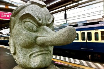 Check out the Tengu statue at Takao Station before you head to Sagamiko Station