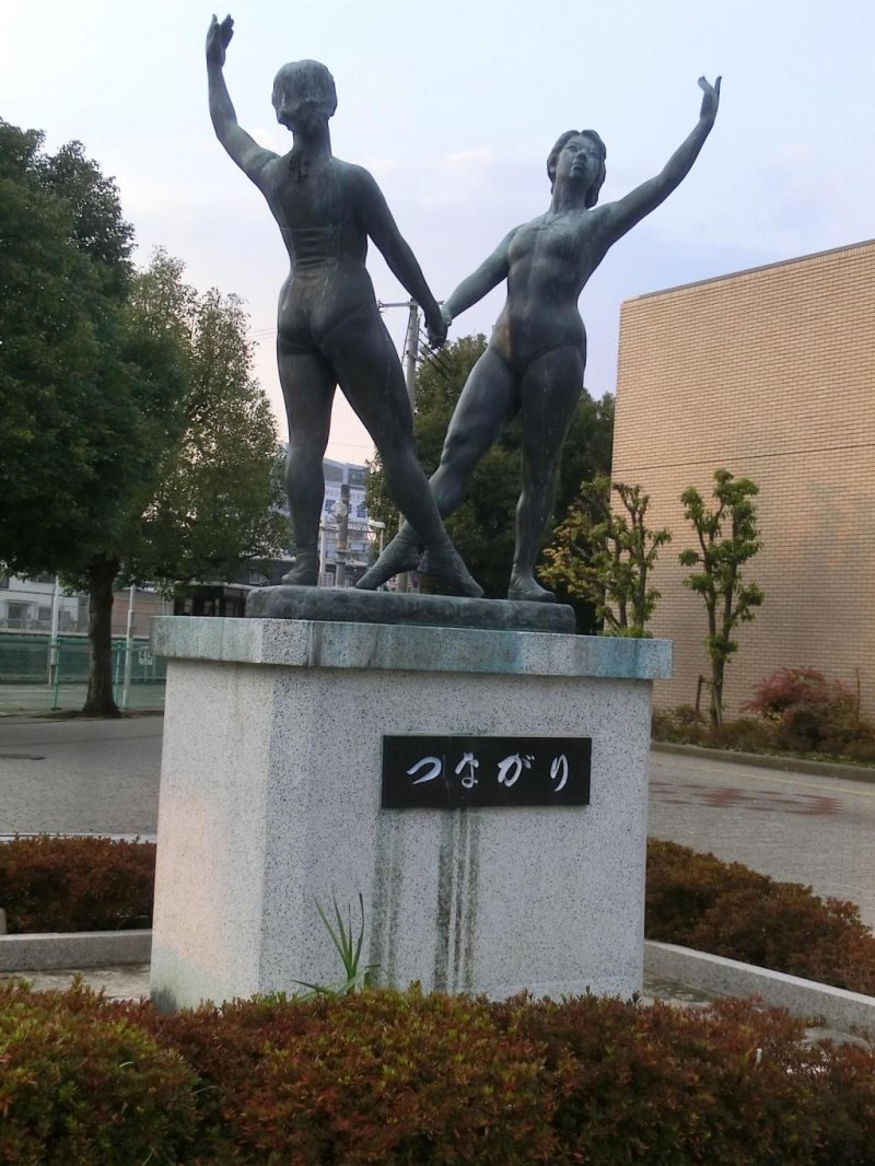 statue in front of JR Yamato Takada station