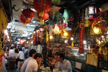 Diners gather at the Chinese small-plates food stall.