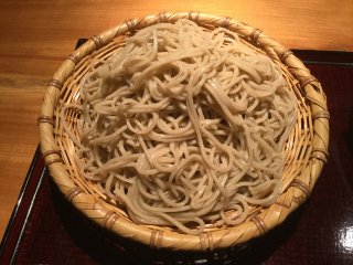 Handmade soba noodles served in a basket