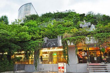 This is the ACROS building. It's a wonderful example of eco-architecture. You can go up into the steps garden during the day to get a nice panorama of Tenjin Chuo Park and the Naka River.