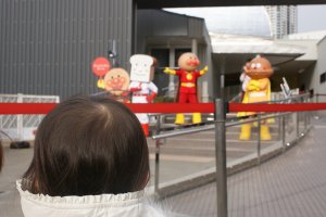 Child being mesmerized by the life sized characters