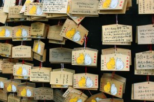 Wooden wishing plaques, called ema, at the Cat Shrine.