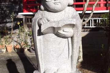 A Buddhist scholar, the only statue I've ever seen with glasses