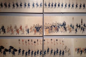 A back wall in the museum shows the procession of Date Yoshikuniko to Tokyo. Although this a is close up, you will be able see hundreds of his vassals and travel assistants pictured when you visit.