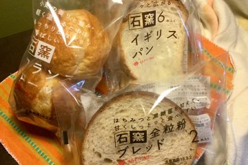 Takaki Bakery breads distinguish themselves in the bread aisle by their minimalist clear packaging through which you could see the high quality bread, and the words "石窯" which means "stone kiln".
