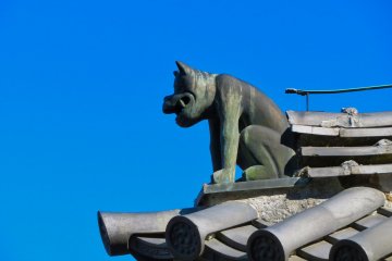 Unique characters on roof of shrine