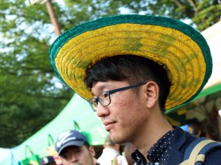 Many festival goers sport the colors of the Brazilian flag: yellow and green. These hats were quite popular.
