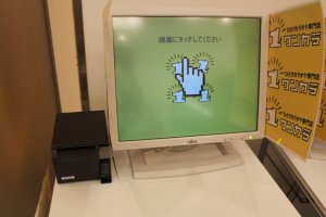 First-timers must register for a point card prior to entering their solo karaoke booth. The registration machines are entirely in Japanese.