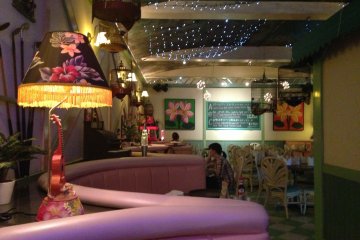 <p>The dining area is brightly colored and romantic, and includes seating in other colors if pink doesn&#39;t tickle you</p>