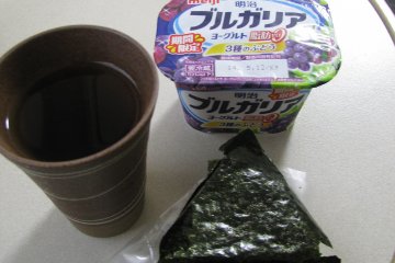 Yogurt and an onigiri rice ball for breakfast