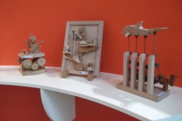 <p>Some of the fun wooden toys (on a shelf at adult height)</p>