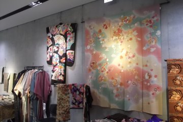 <p>Kimonos and fabrics for sale in one of the rental spaces on the first floor</p>