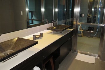Incredible villa bathroom with inside onsen