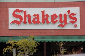Once in the Navel Kadena shopping center, look for the building with the Shakey' sign on the exterior