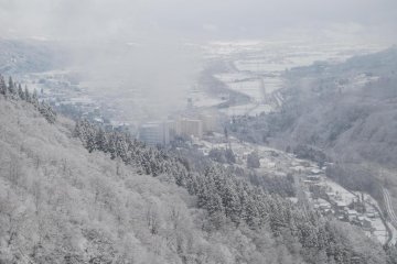 View of Yuzawa Onsen from the top of the mountains. 