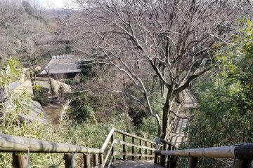Another hiking trail with steep steps and a view of the folk houses