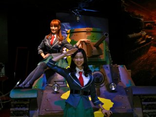 What war game would be complete without girls draped on a tank?