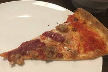 Pizza served by the slice