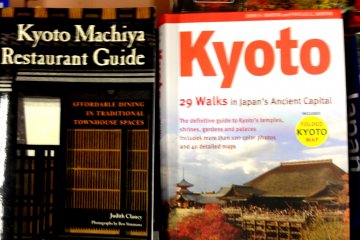 A number of English Language travel books are laid flat making it easy to pick up and browse