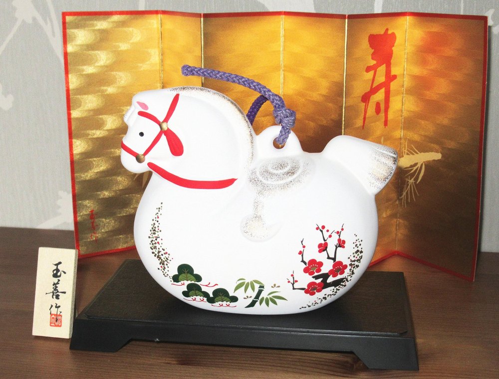 Zodiac Horse is decorated with matsu, take and ume